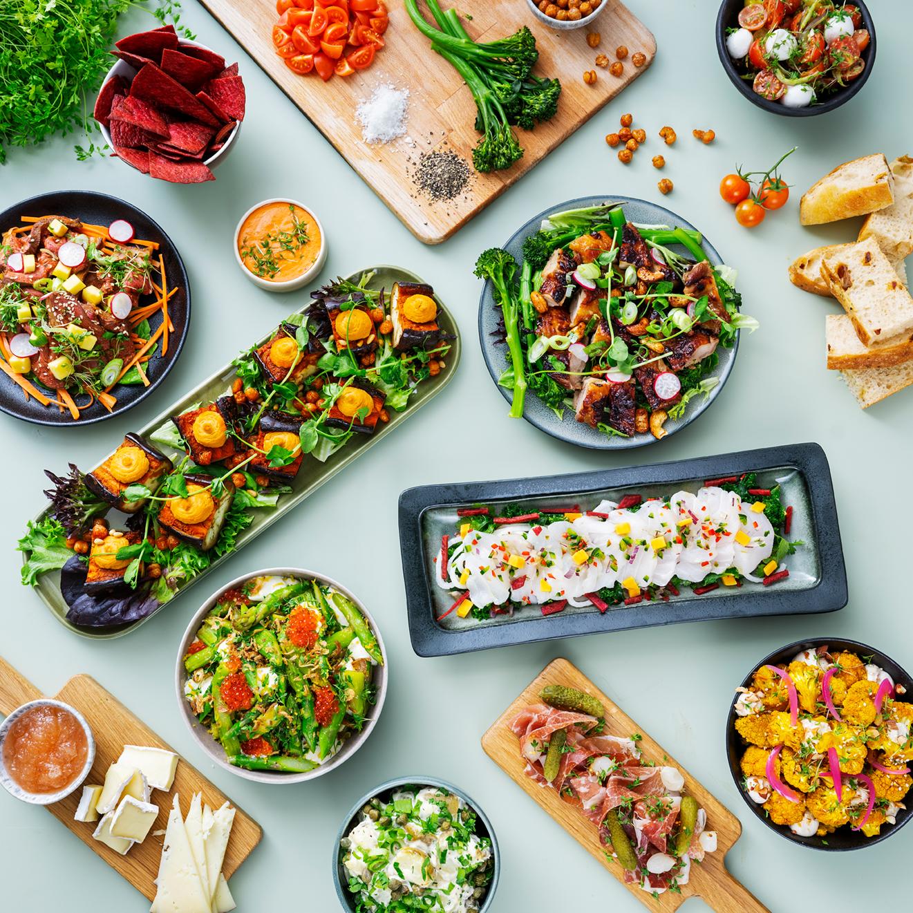 Chef puts dishes on a plate